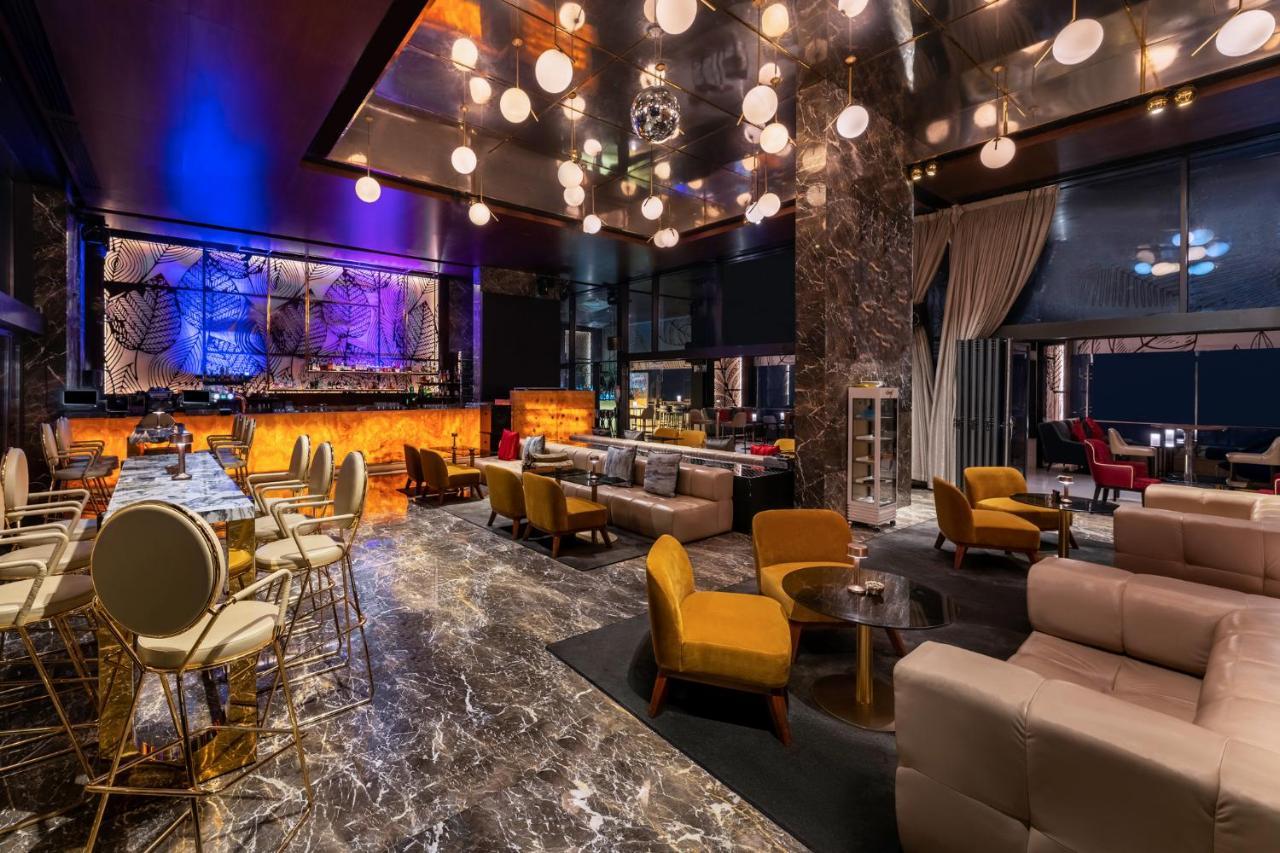 迪拜瑞享大广场酒店 外观 照片 The interior of the bar